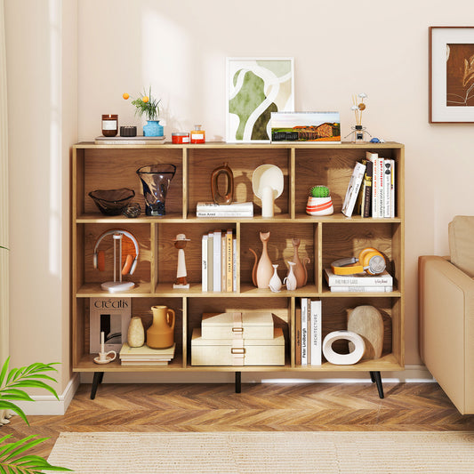 The wooden bookcase filled with decorative items and books in a living room setting