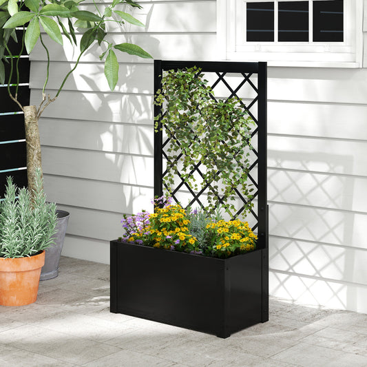 Black metal planter box with trellis on a patio with a large potted plant nearby
