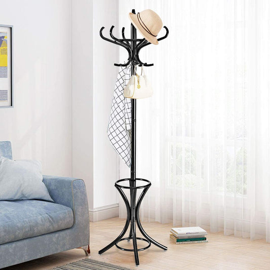 The coat rack is shown with a hat and a scarf draped over its hooks, next to a sofa