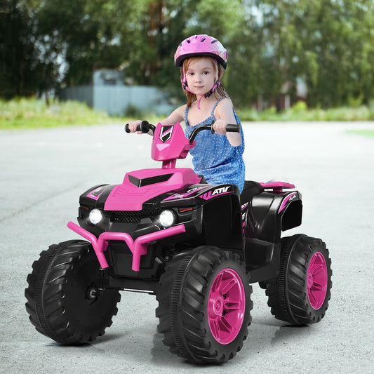 A young girl wearing a pink helmet rides the pink electric quad bike