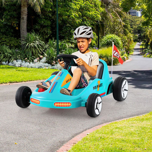 A young boy wearing a helmet drives the blue kids electric go kart on a paved path