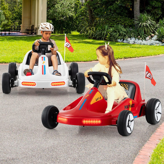 Two kids riding white and red electric go karts on a paved path