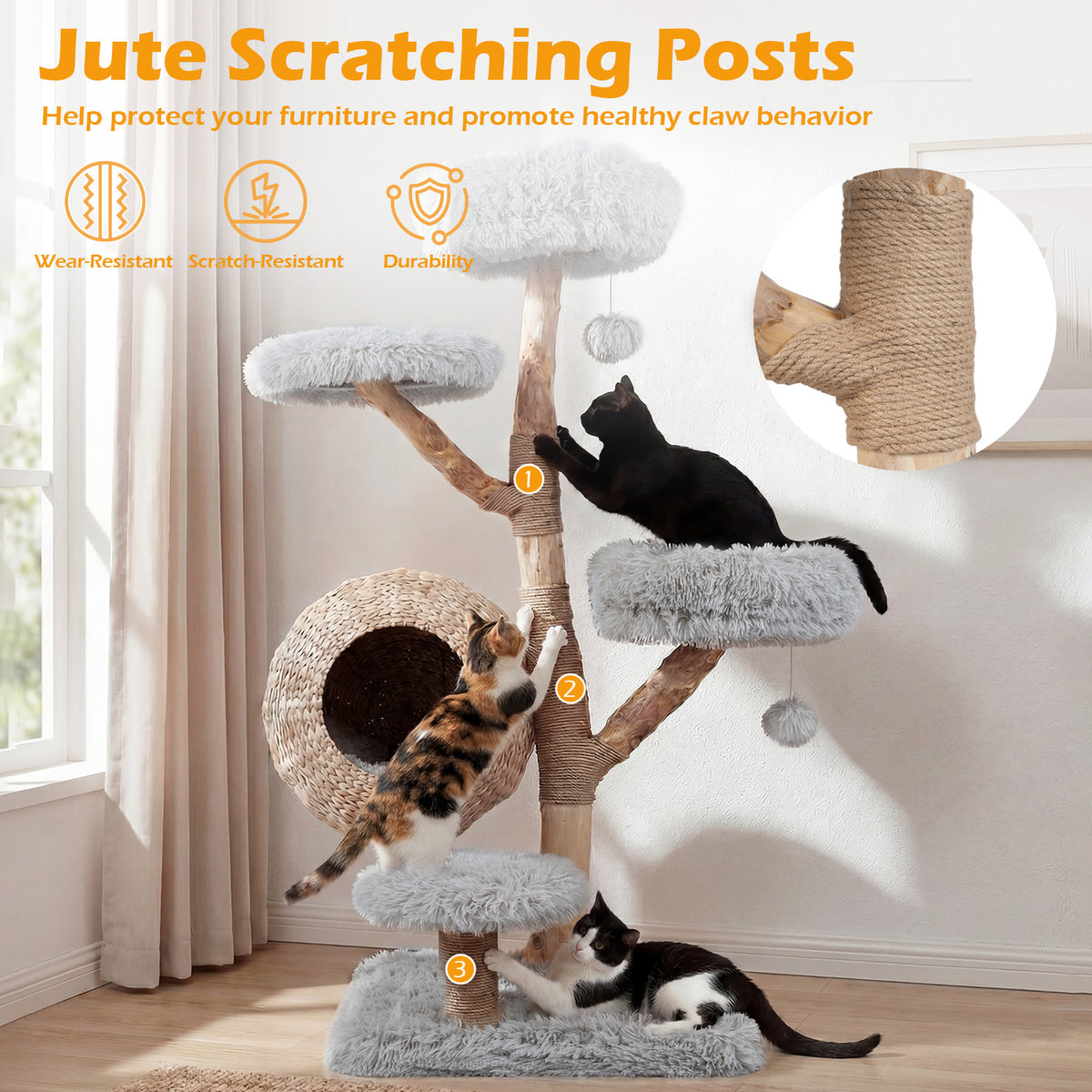 The cat tree with cats scratching the jute wrapped posts to show durability and function
