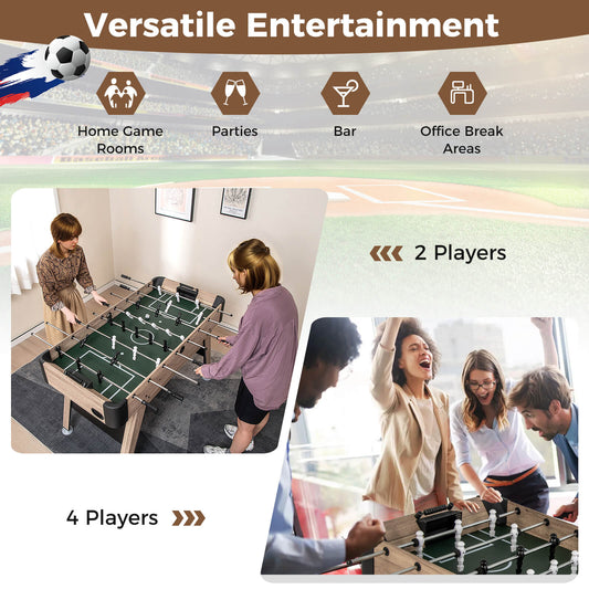 The soccer game table being used by people in a home and office setting
