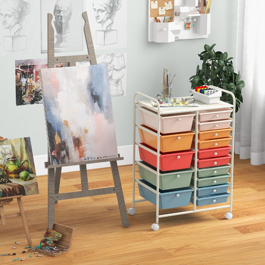 The rolling cabinet placed in an artist studio next to an easel with painting supplies