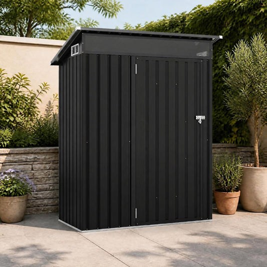Dark grey outdoor storage shed with lockable door and sloping roof, situated in a garden setting