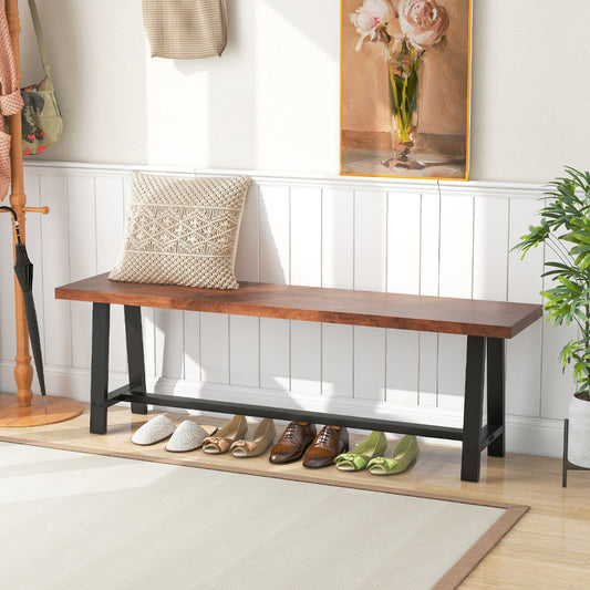 Walnut shoe rack bench with black metal frame in a hallway with shoes underneath