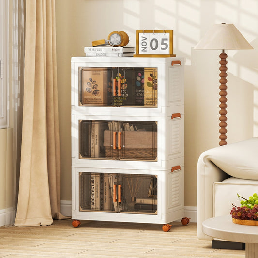 The stackable plastic collapsible storage bins with lids shown in a living room setting next to a sofa