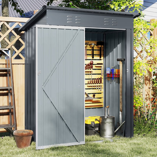 The garden shed with the door open revealing tools stored on a wall rack