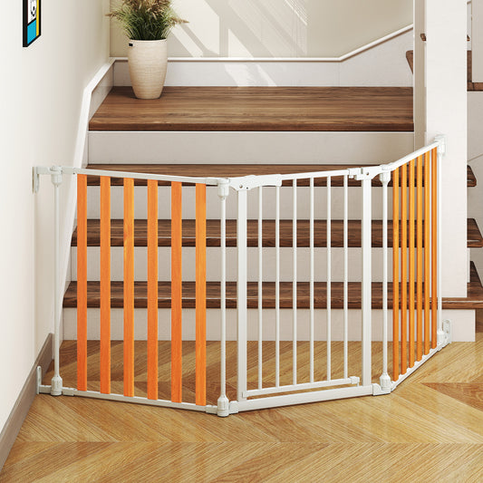 The configurable pet gate set up at the bottom of a wooden staircase