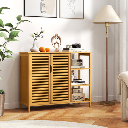 Bamboo bathroom cabinet with slatted doors in a bright room with a lamp and artwork