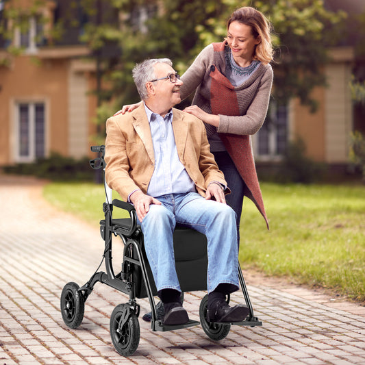 The black rollator being used as a wheelchair by an elderly man outdoors on a paved path
