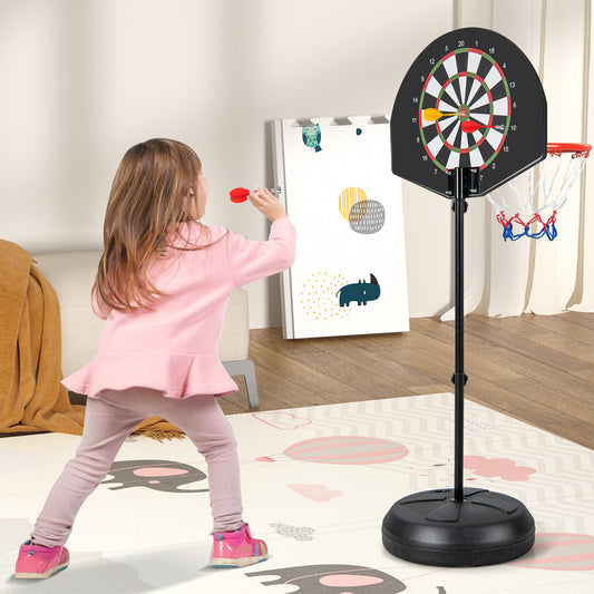 The sport equipment in use indoors with a girl throwing a dart at the dart board