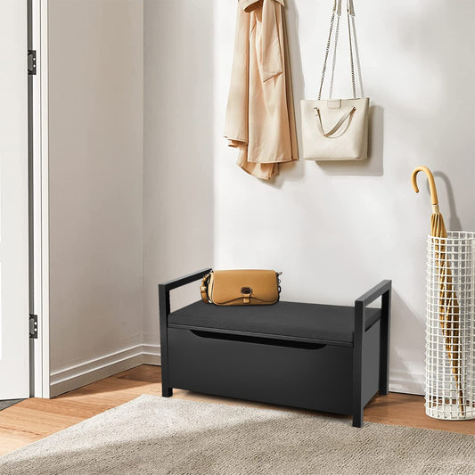 The storage bench placed in a bright hallway with a handbag resting on the cushioned seat