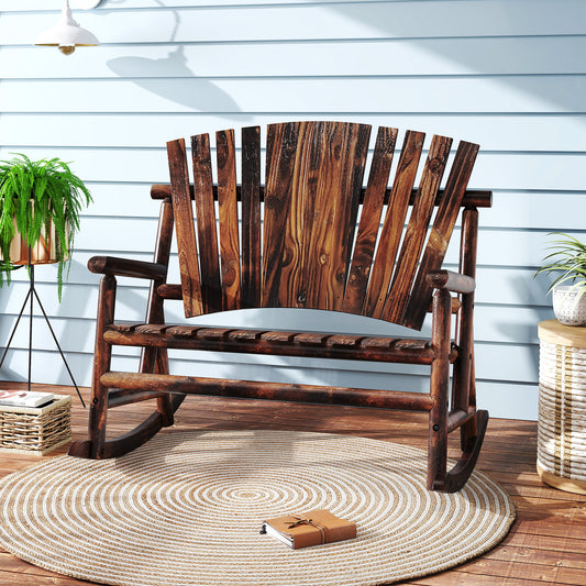 The wooden rocking bench is placed on a round rug on a patio