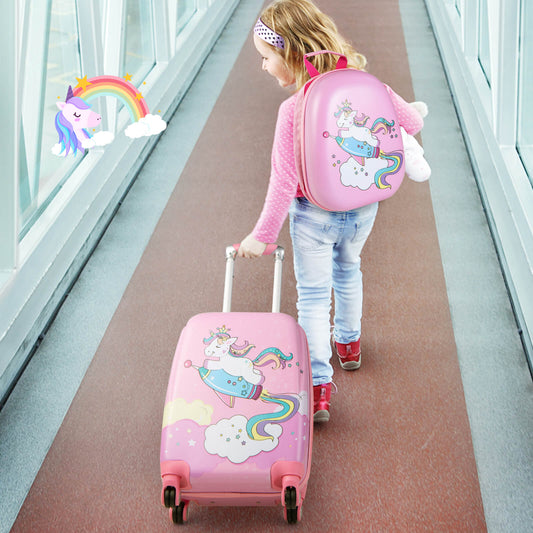 Young girl pulling the kids luggage set with spinner wheels through an airport terminal