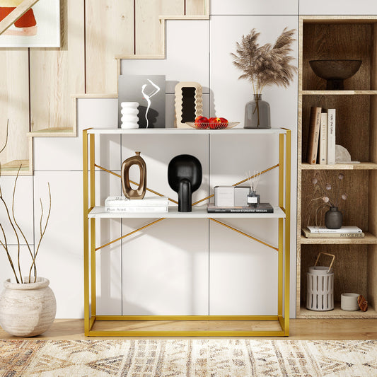 The console table styled with decorative ornaments and books in a bright living room