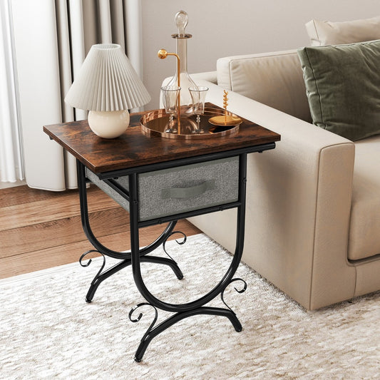 The industrial bedside table with drawer shown in a living room setting next to a sofa