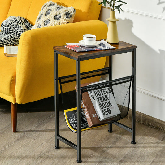 The narrow sofa side table in a living room next to a yellow sofa, holding books and a cup