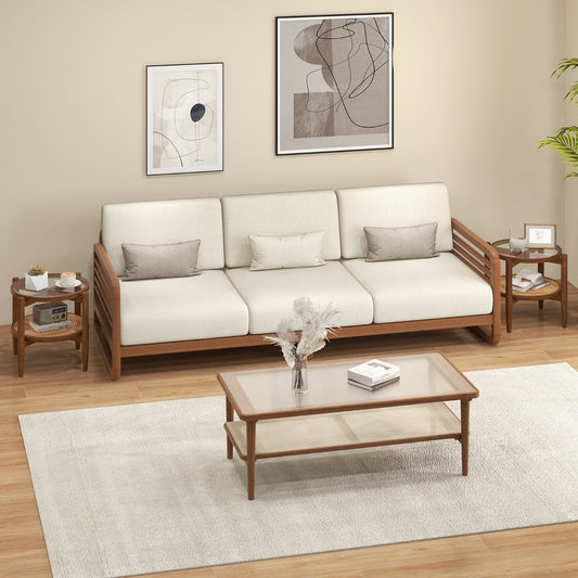 Two round end tables in a living room setting next to a sofa