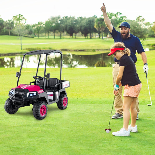 A father and daughter playing golf with the kids electric car on the grass