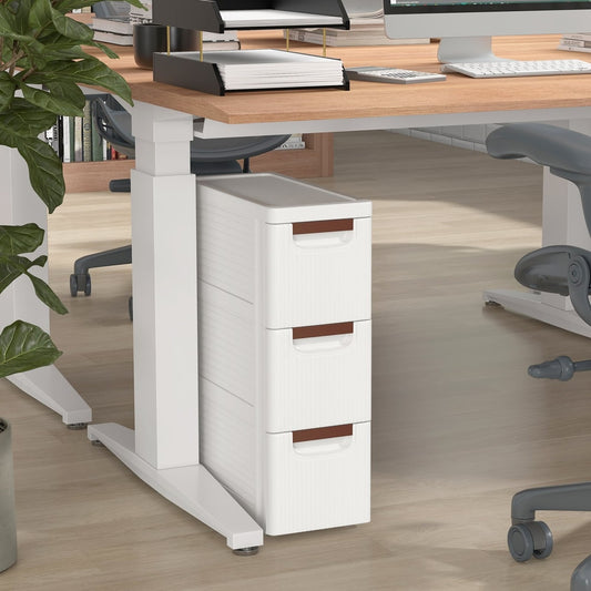 The narrow storage cabinet fits neatly under a desk with office supplies