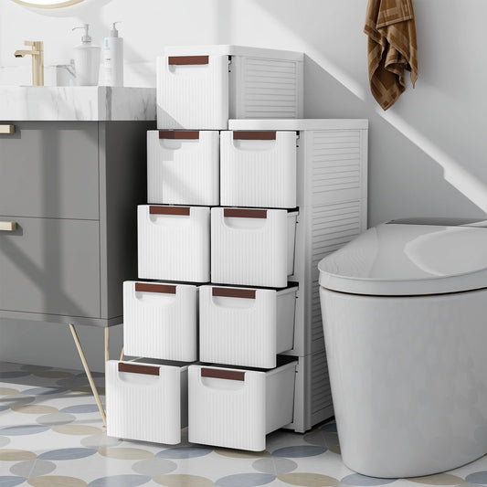 The storage cabinet with all drawers pulled out in a modern bathroom setting