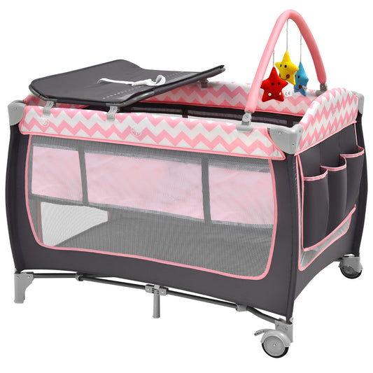 The baby playpen and playard in light pink, showing the changing mat attachment