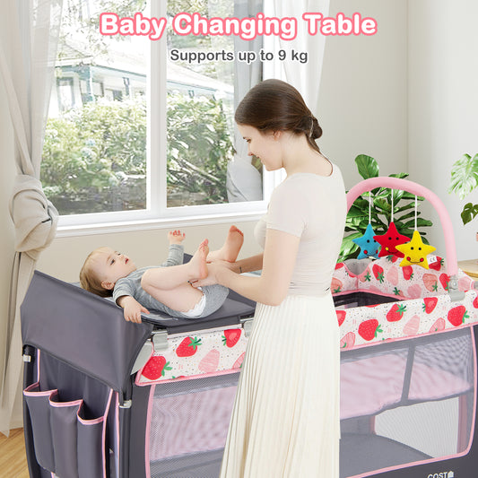 The baby playpen with a changing table attachment being used by a mother