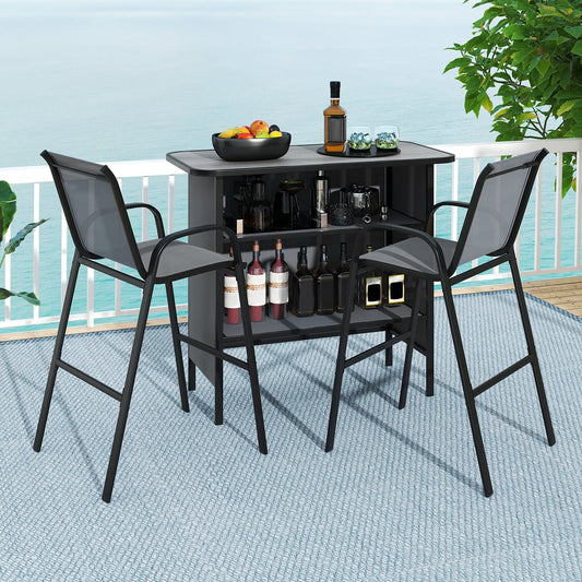 Grey outdoor bar table and chairs set on a balcony overlooking the sea
