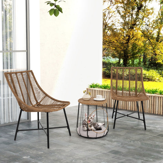 The patio furniture set arranged on a tiled balcony with a kitten resting inside the table base