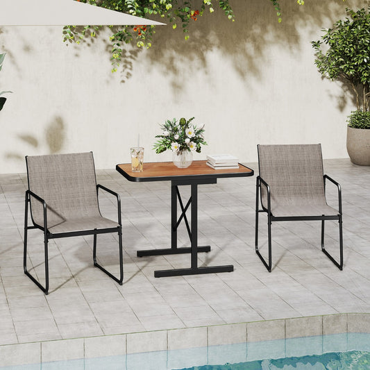 The patio furniture set placed by a swimming pool on a sunny day