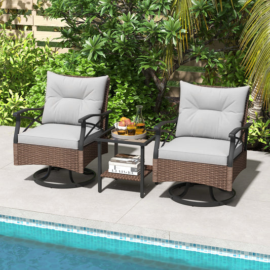 The patio furniture set placed on a patio by a swimming pool with lush green plants behind