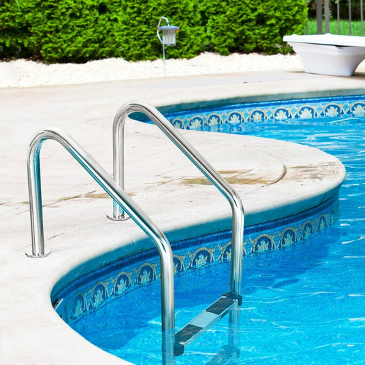The stainless steel swimming pool ladder installed on the edge of a tiled pool