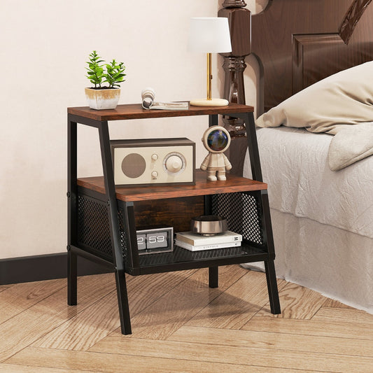 The industrial nightstand placed next to a bed with a lamp and plant on top