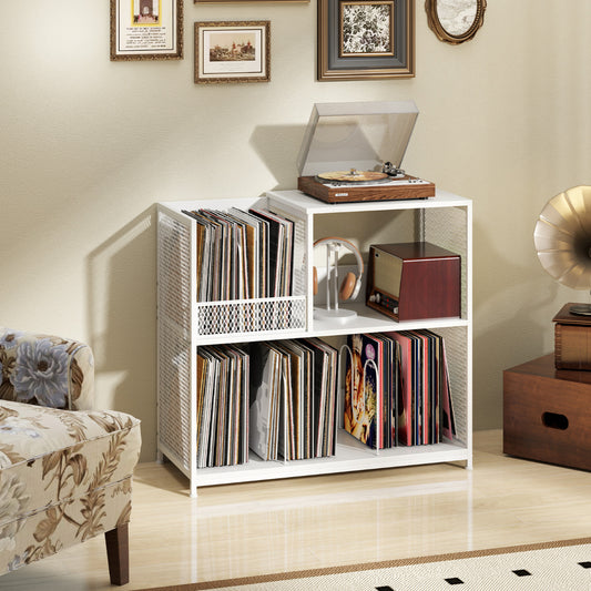The white storage unit placed in a living room next to an armchair with a turntable on top