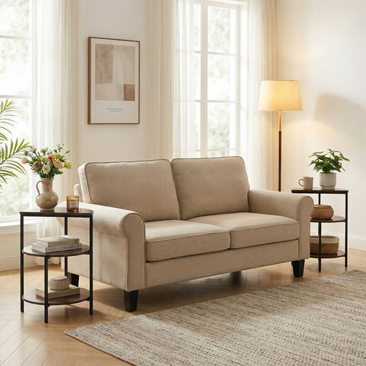 Two round side tables in a living room next to a sofa