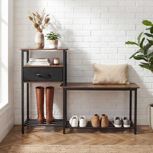 The storage bench placed against a white brick wall with boots and shoes on the lower shelves