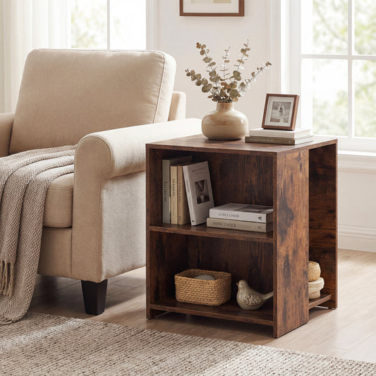 The rustic brown wooden end table is shown next to an armchair with books and a vase on top