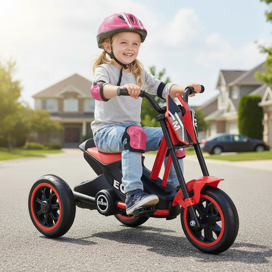 The toddler bike being ridden by a young girl wearing a helmet and pads on a suburban street