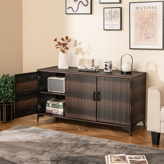 The brown wicker storage cabinet is open showing two shelves with books and a vase