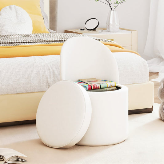 The white vanity stool with backrest in a bedroom, with its lid open showing books inside