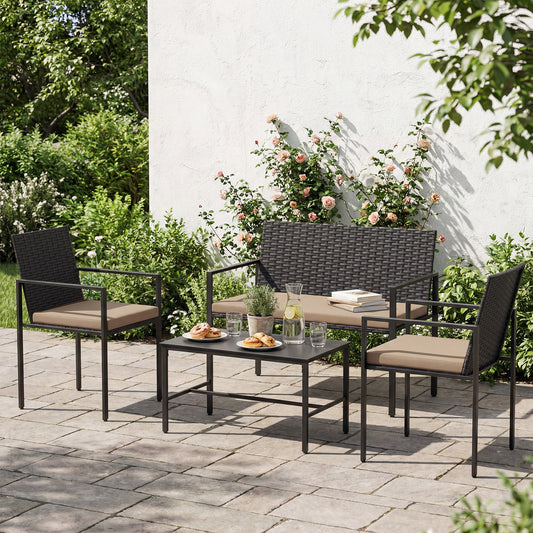 The outdoor rattan chairs and loveseat set arranged on a patio with plants