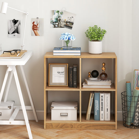 The wooden storage cabinet in a home office setting, styled with books, a plant, and framed pictures on a desk