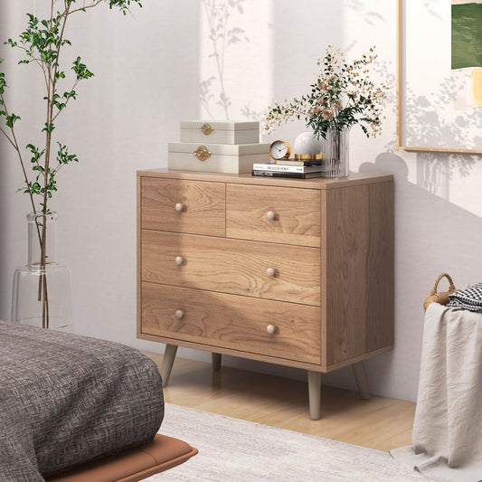 The modern storage chest cabinet in a bedroom setting next to a bed