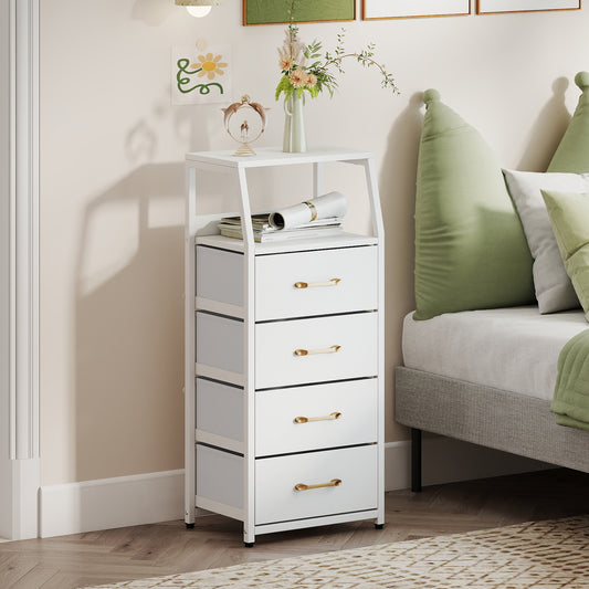 The storage cabinet placed beside a bed in a bedroom with books and a vase on top