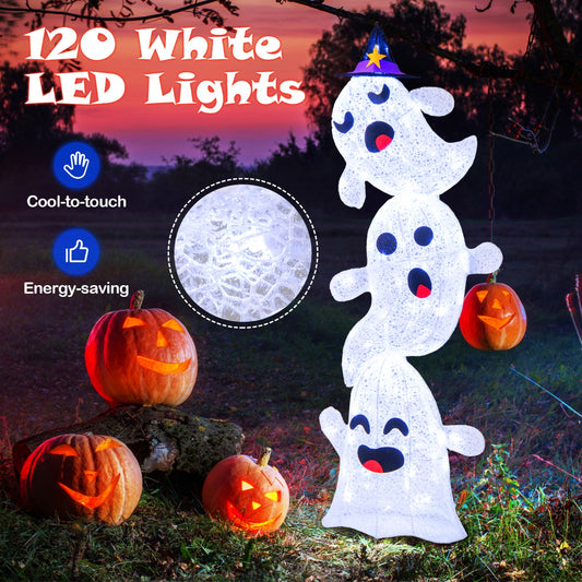 The Halloween decoration with 120 white LED lights, shown outdoors at night with pumpkins