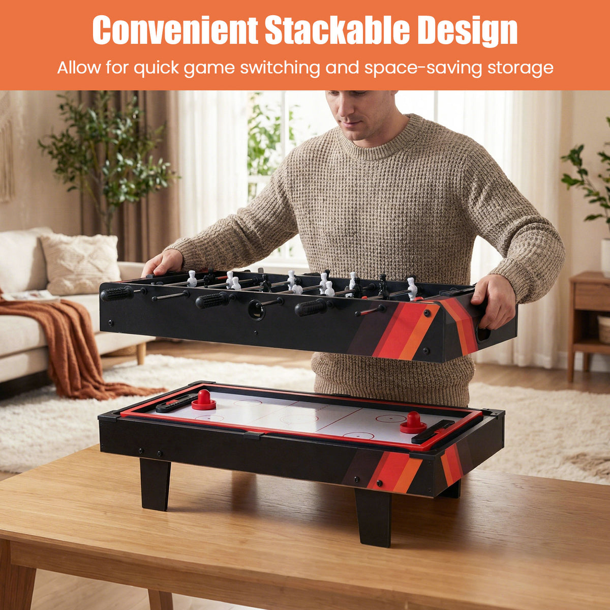 Man stacking the game table tops for storage