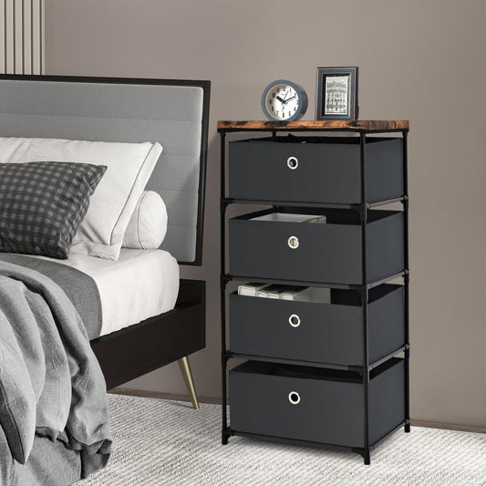 The black fabric dresser with drawers and metal frame in a bedroom setting next to a bed