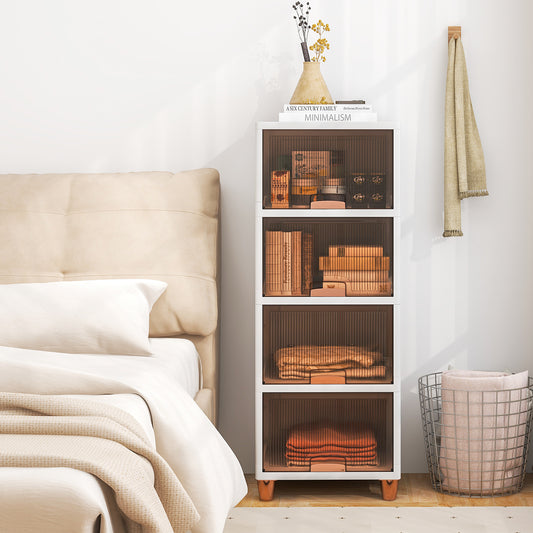 The storage unit placed next to a bed with books and decor items inside the transparent compartments
